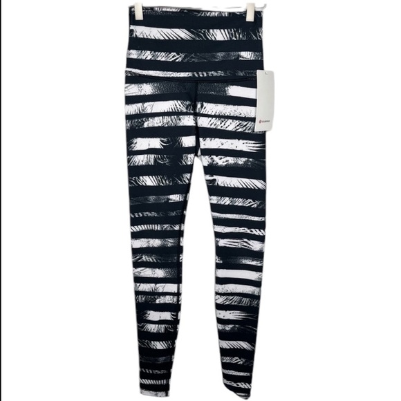 lululemon athletica Pants - Lululemon Wunder Train High Rise Leggings 25” Length Black White Size 2